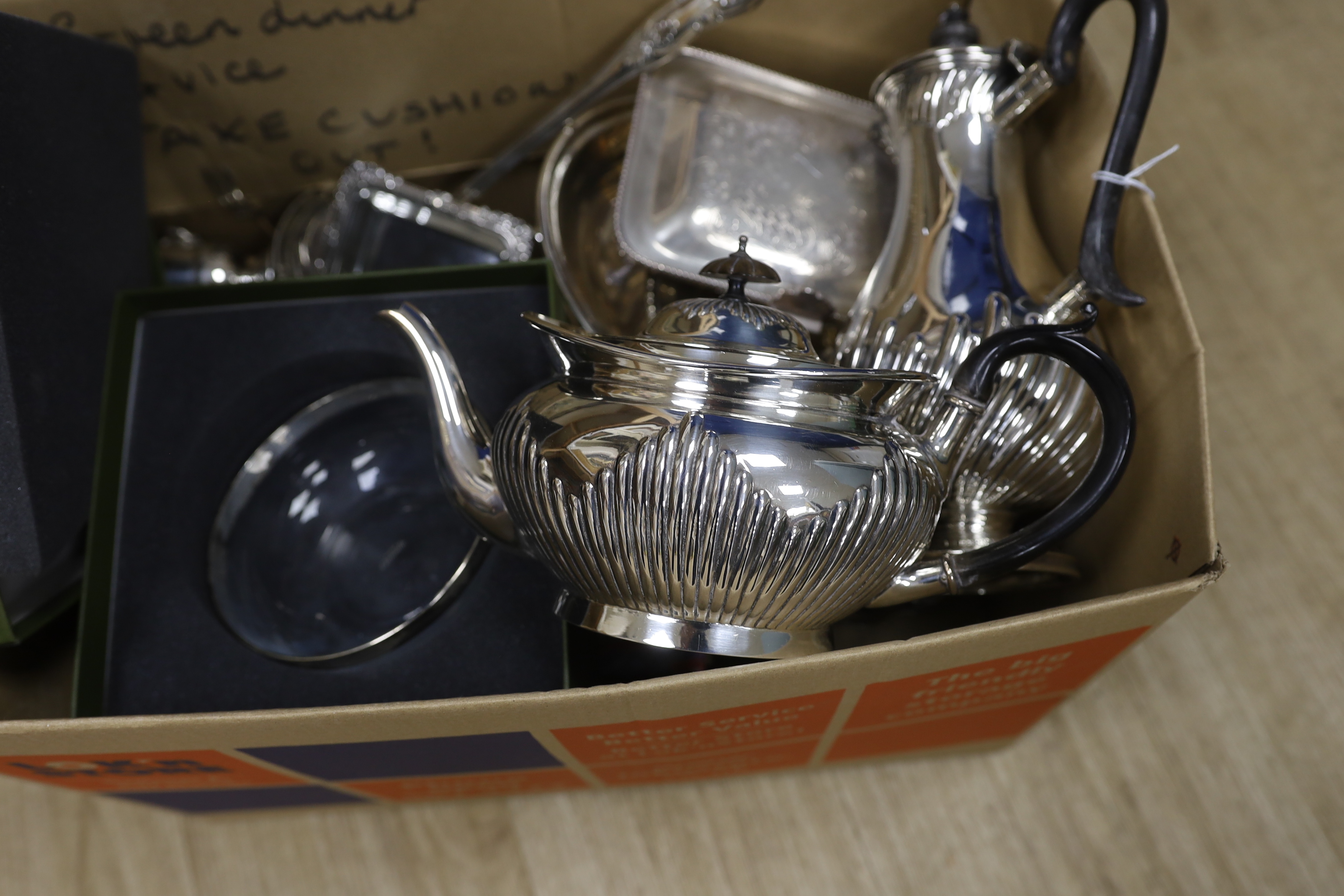 Assorted plated wares including coasters, tea set, flatware, entree dish etc., and a Christofle glass bowl